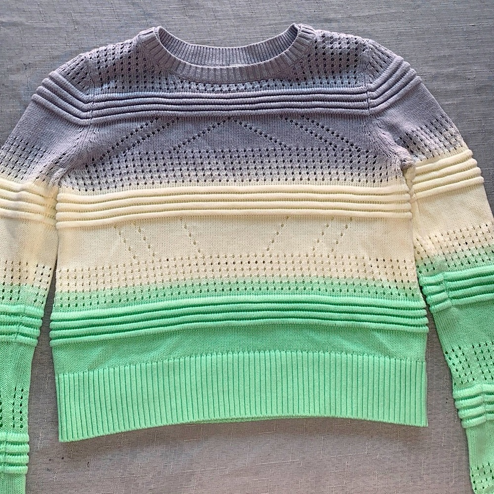 Hombre sweater with thumb holes.